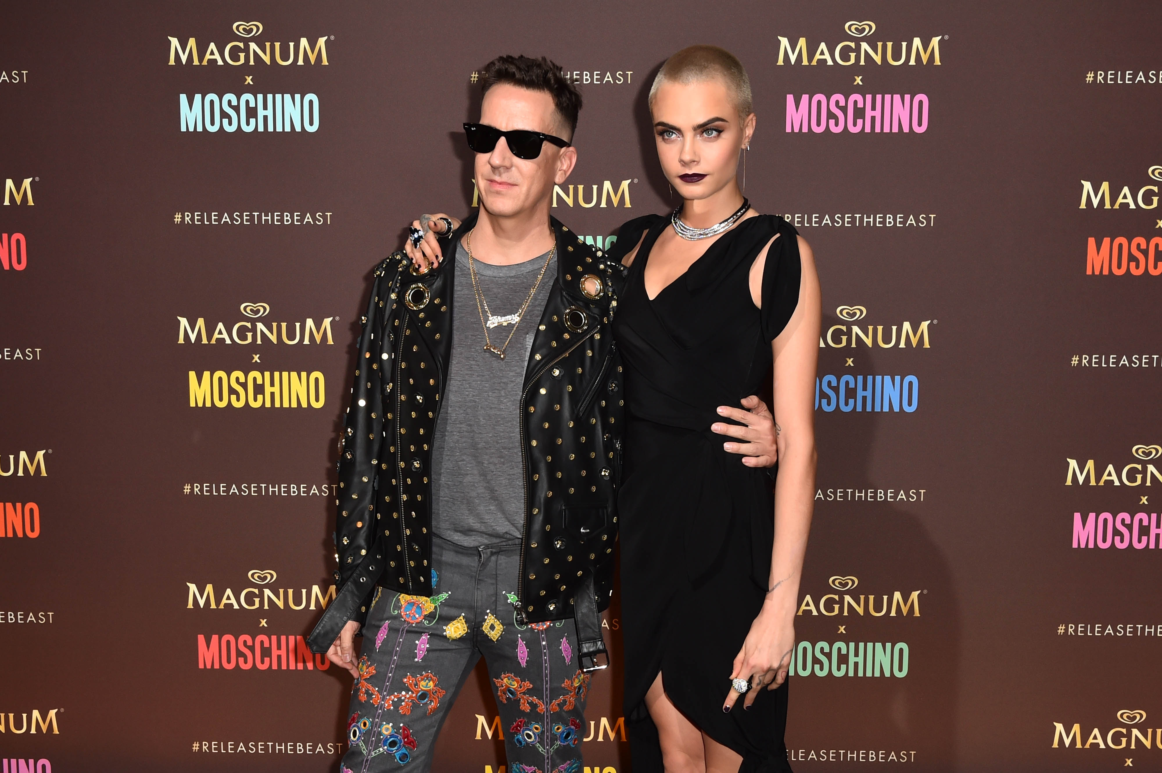 Cara Delevingne, and Jeremy Scott, Moschino Creative Director, arrive at the Magnum x Moschino ÔRelease the BeastÕ party in Cannes, France. PRESS ASSOCIATION Photo. Picture date: Thursday May 18, 2017. Photo credit should read: Matt Crossick/PA Wire